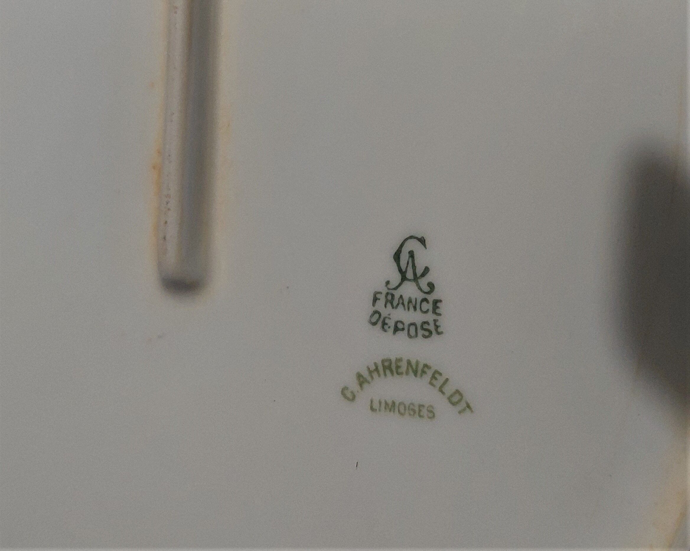 Oval serving dish in porcelain floral decoration Charles Arhenfeldt Limoges