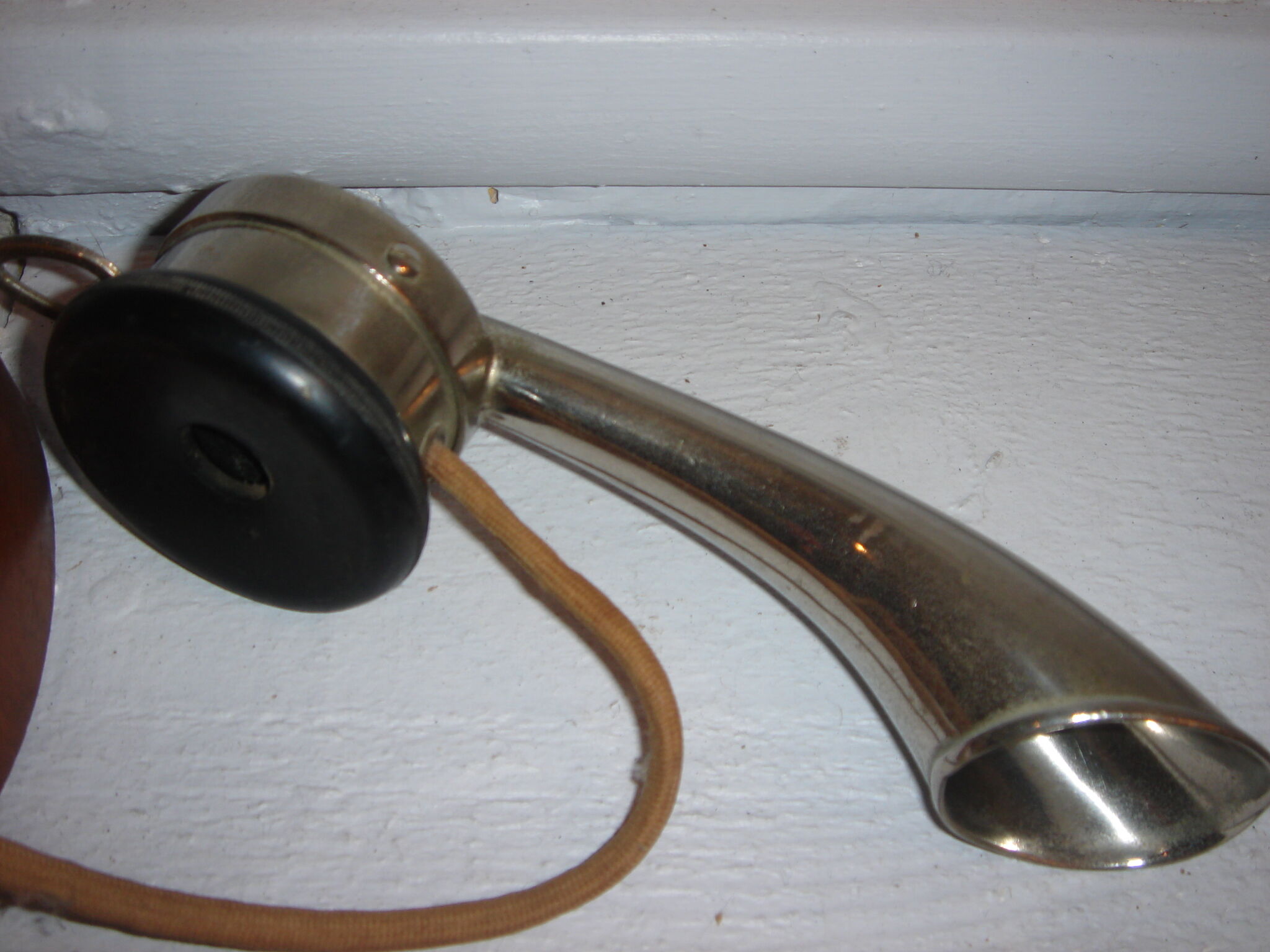 phone to cornea in 1900 on column with metal switch chrome