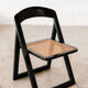 Folding black cannage chair