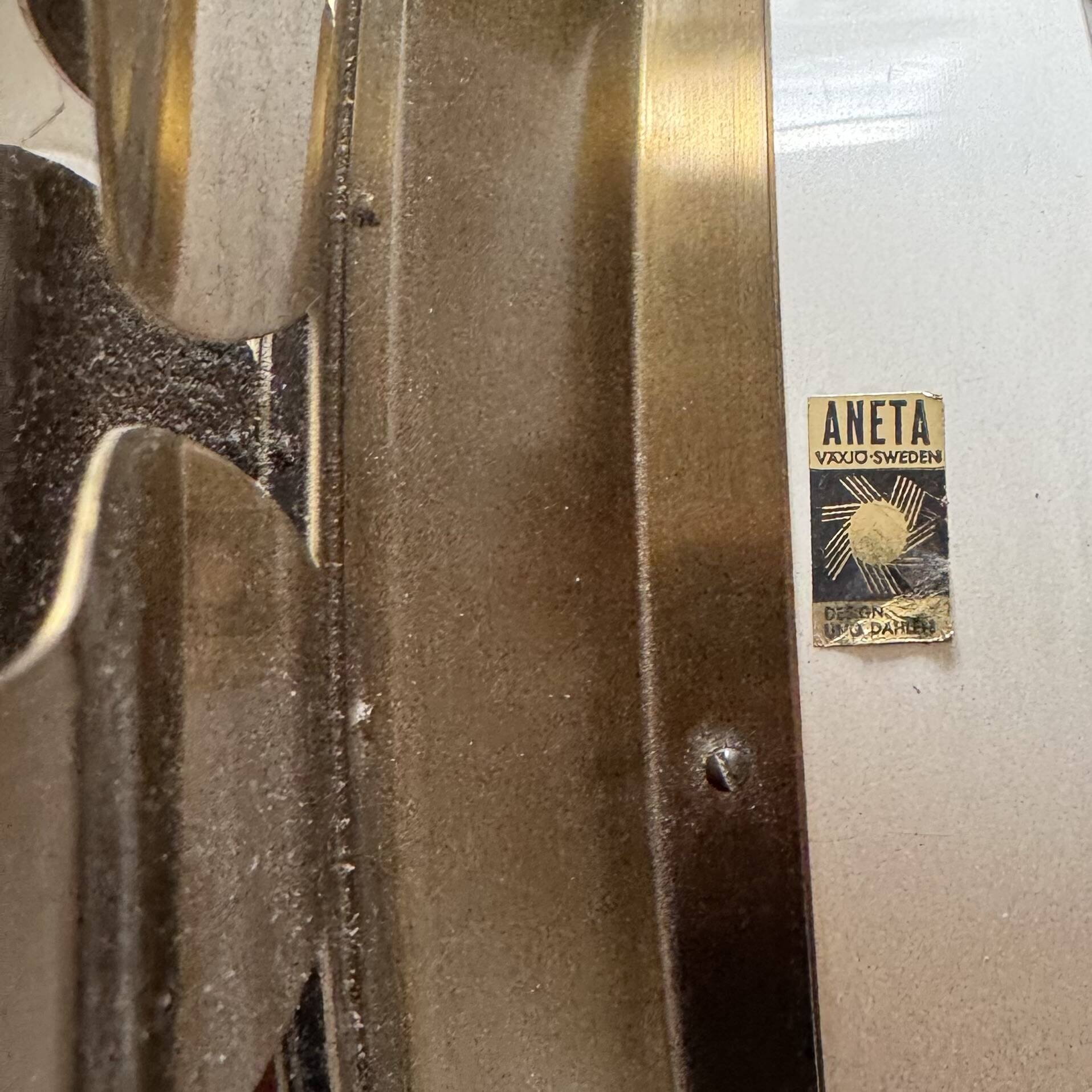 Vintage brass and pressed glass wall light, Sweden, 1960.