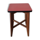 Wooden stool and red formica