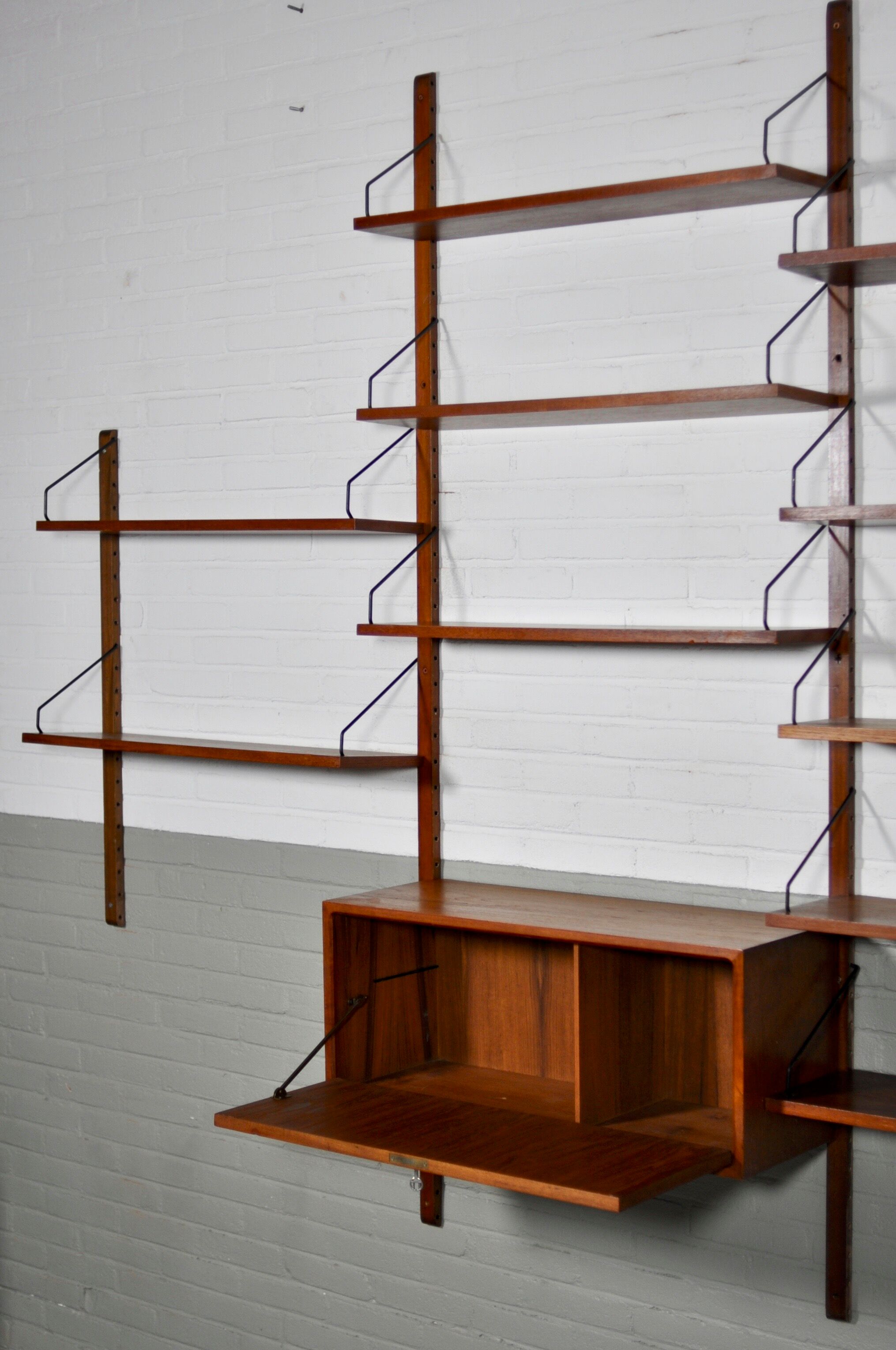 Danish Royal Wall System shelving unit by Poul Cadovius