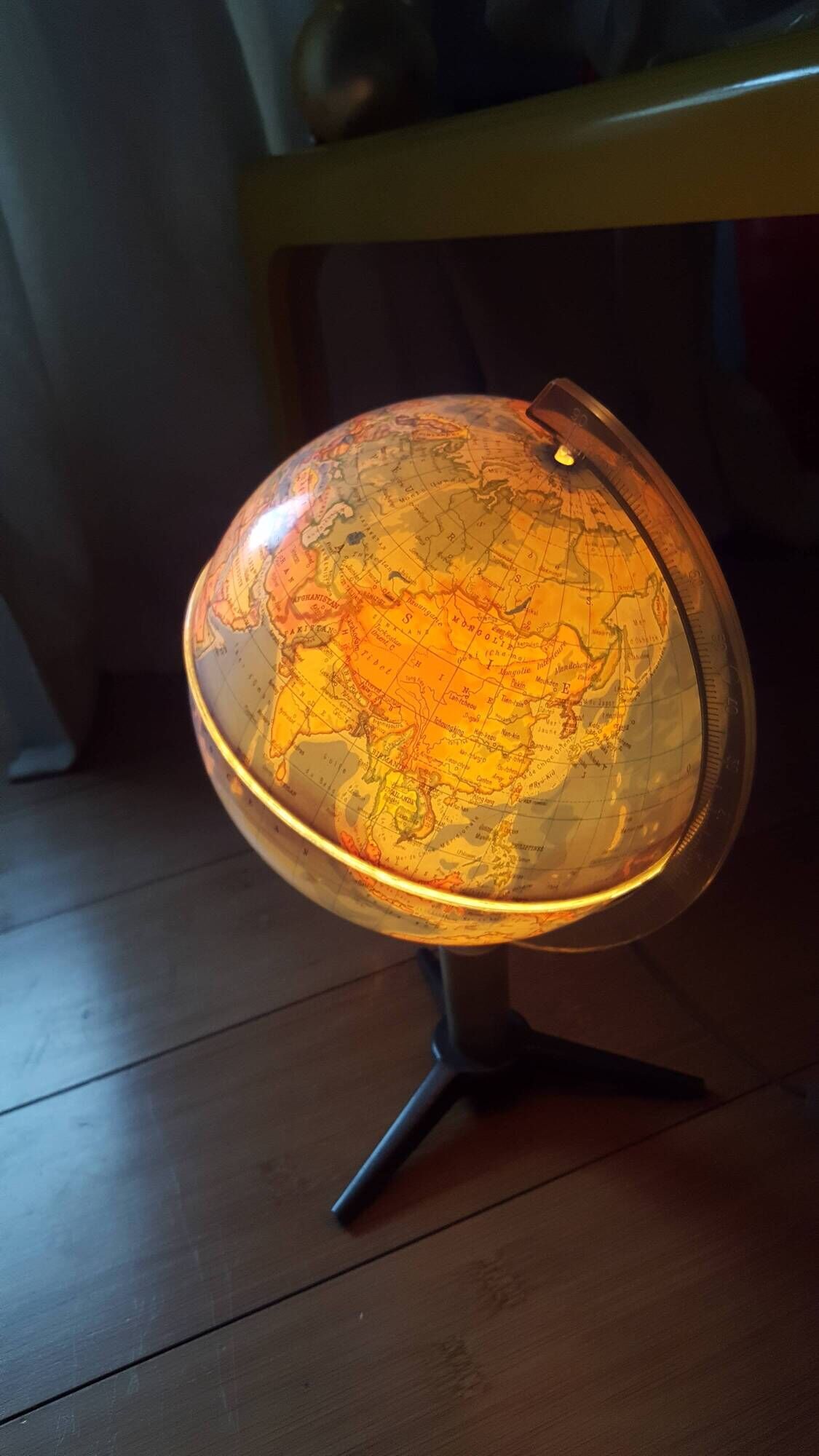 Bright vintage Earth globe brand Vulliermes with metal tripod foot