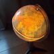 Bright vintage Earth globe brand Vulliermes with metal tripod foot