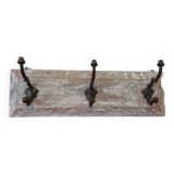 Wooden hanger in a rustic style.