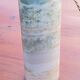 Designer lamp from the 70s in almond green onyx with original fabric shade