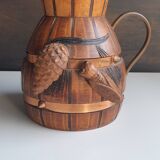 Wooden and copper jug