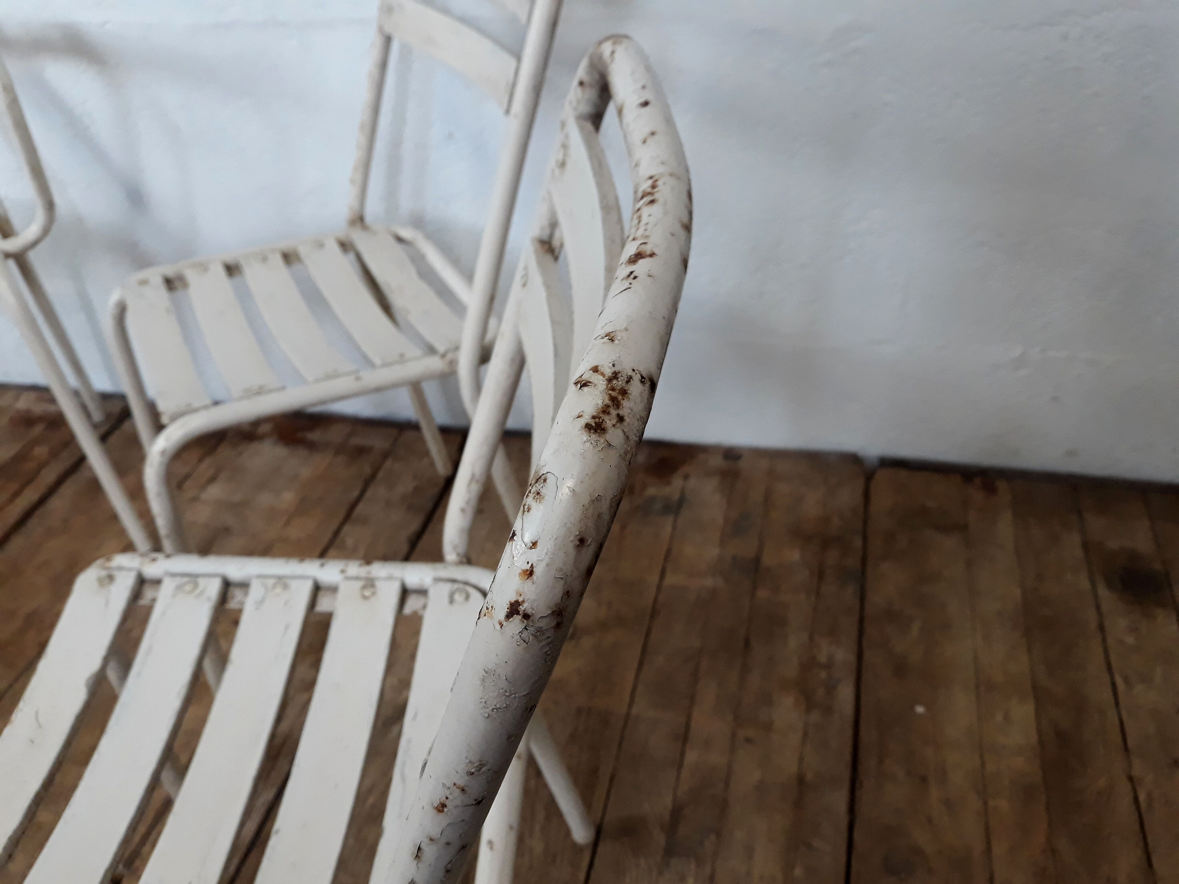 4 chairs and armchairs by Tolix