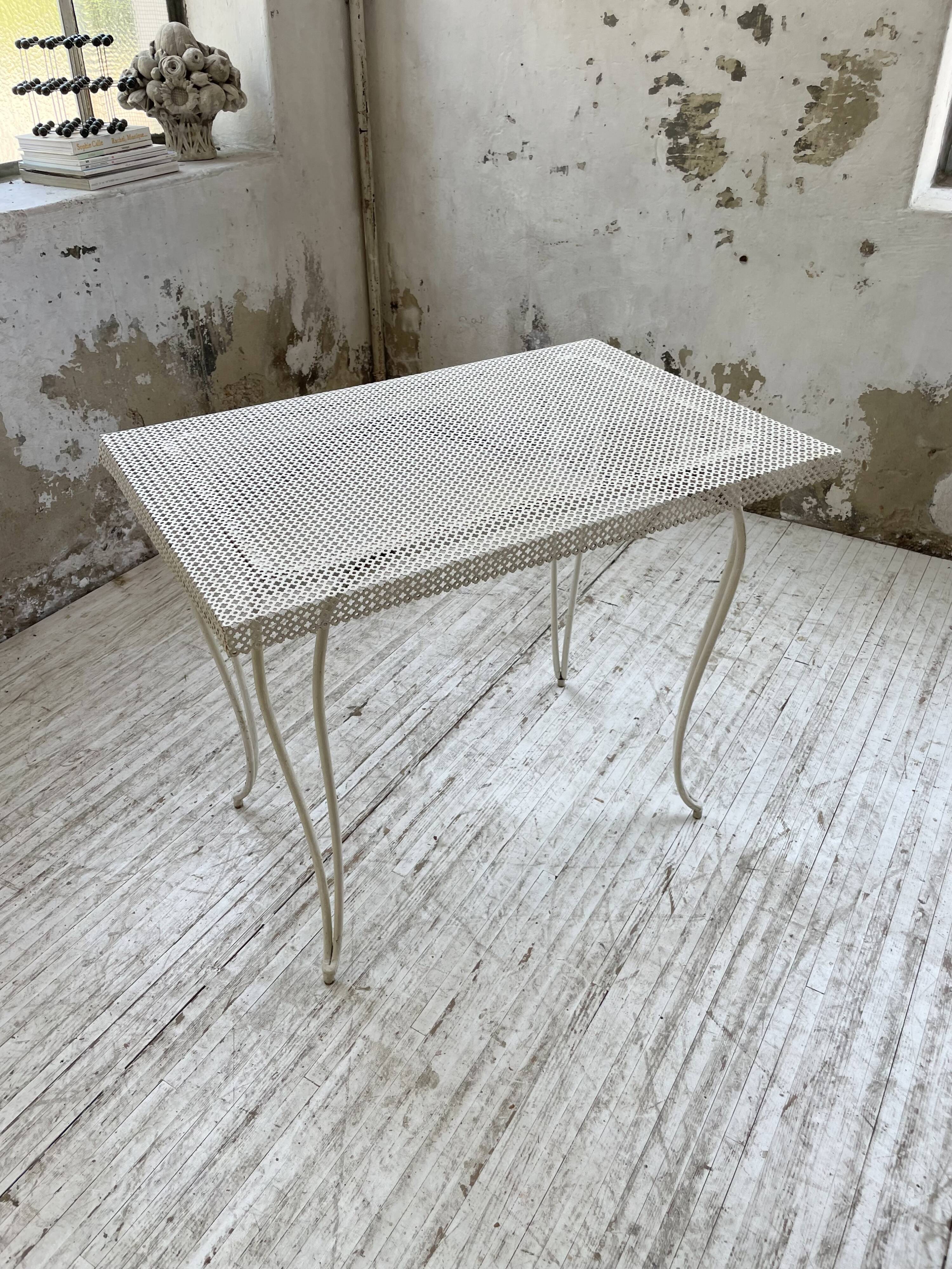 Perforated garden dining table