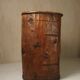 Primitive folk art cabinet made of an old tree trunk.