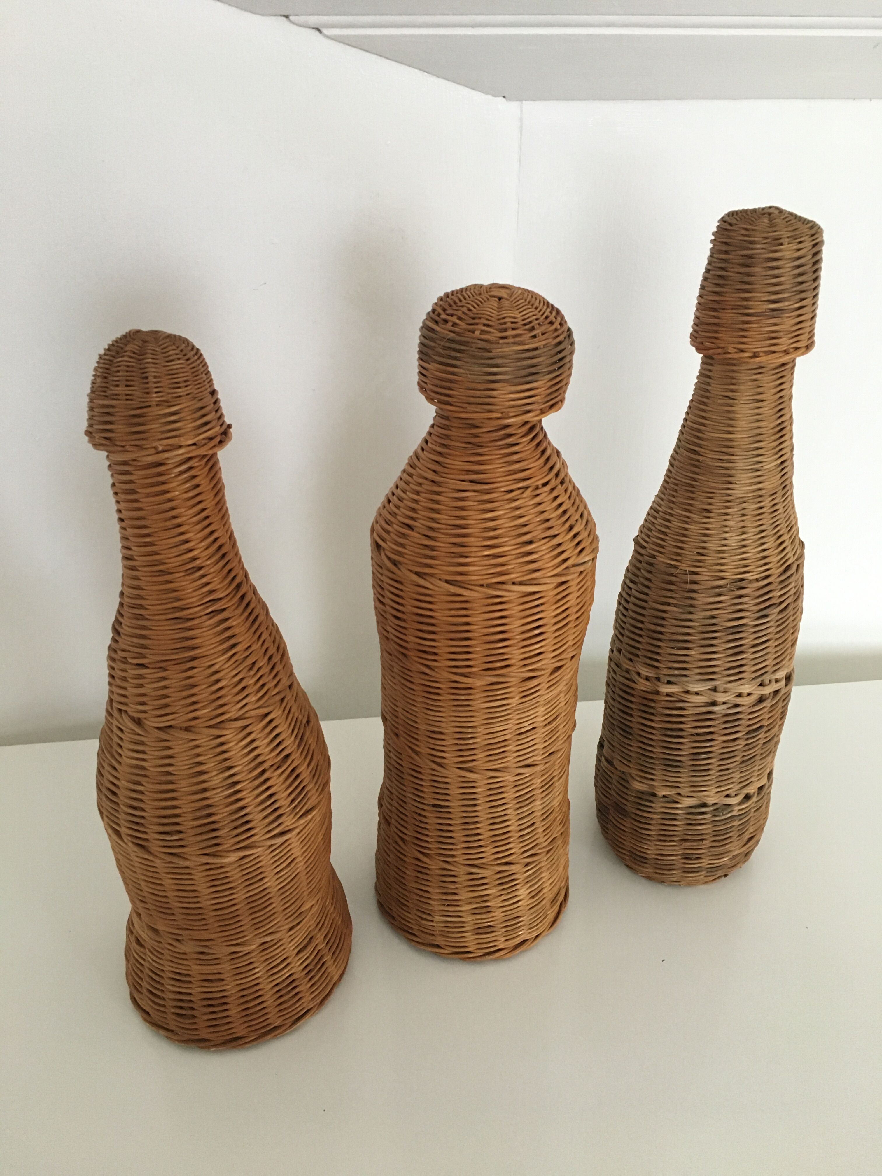 Set of 3 rattan bottles