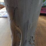 Beige colored vase from the vallauris brand with flower pattern