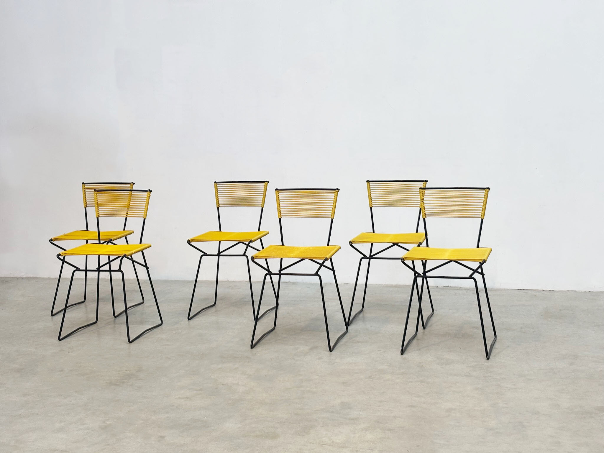 Set of six 'Spaghetti' dining chairs