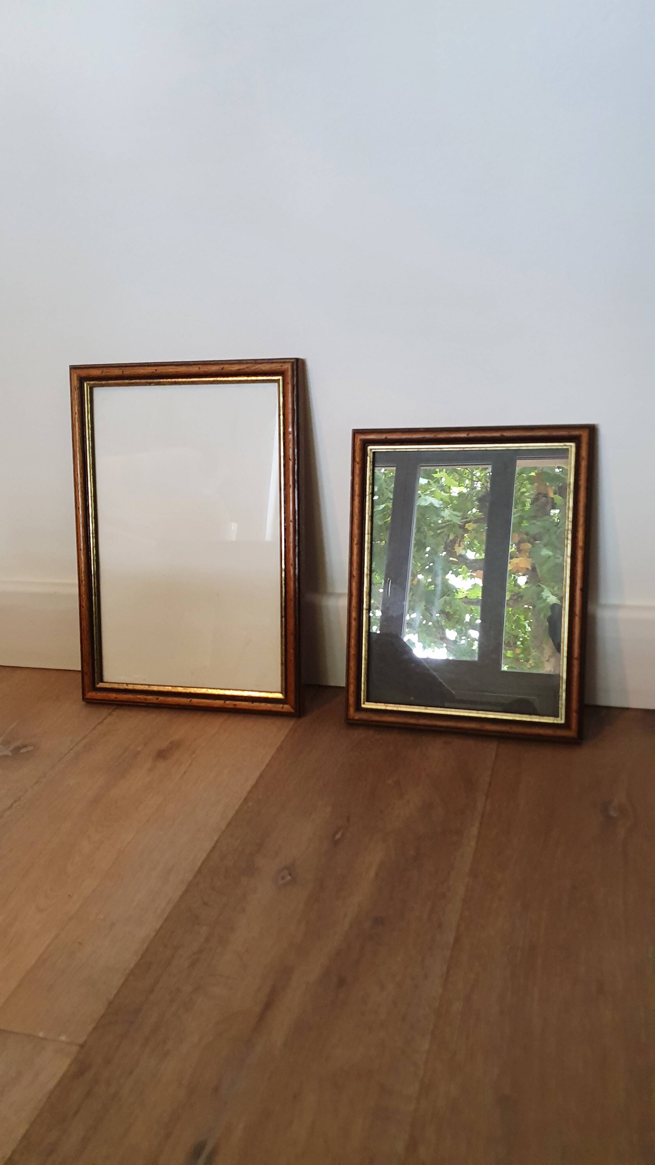 Set of 2 wooden frames with gilded edging