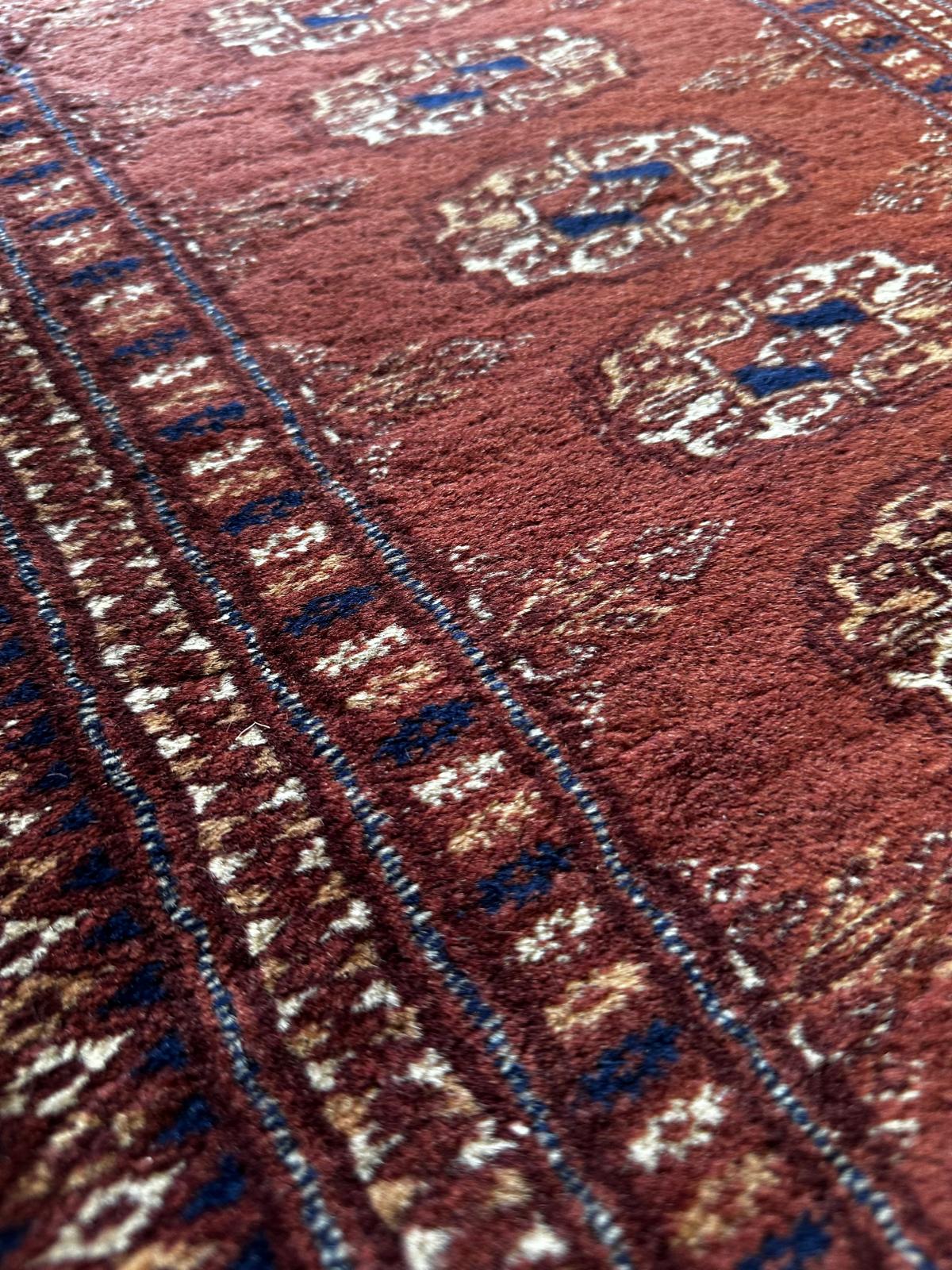 Handmade oriental hallway rug, 180cm x 70cm.