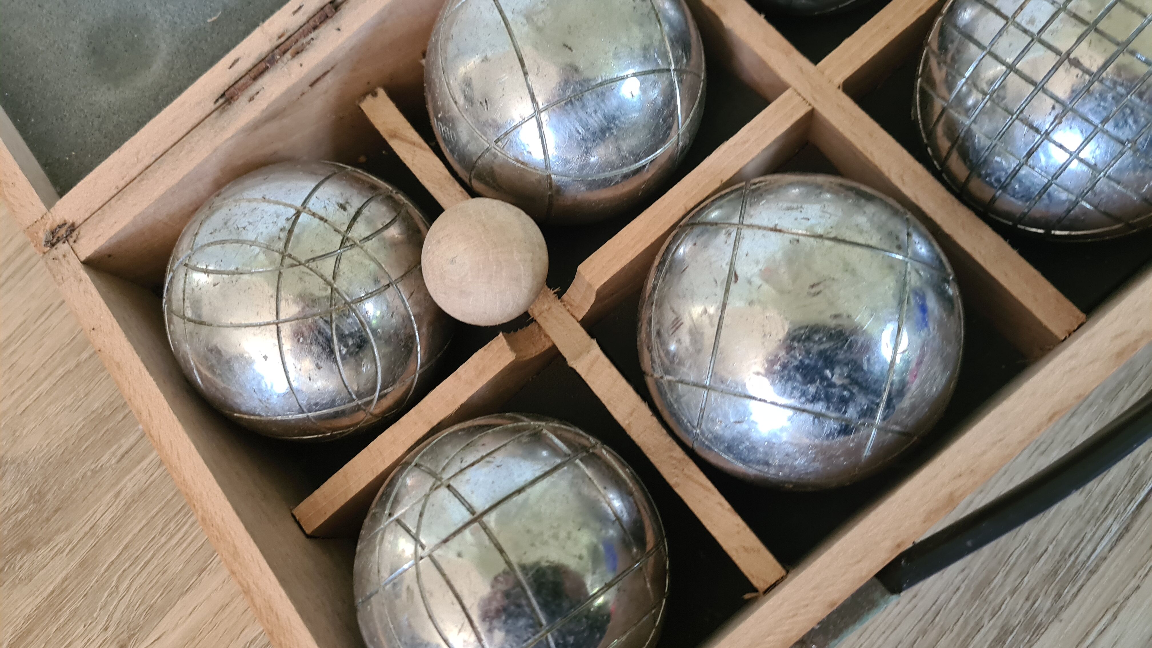 Old obut balls with original wooden box