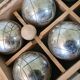 Old obut balls with original wooden box