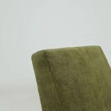 Mid-century modern design armchair in olive green corduroy.