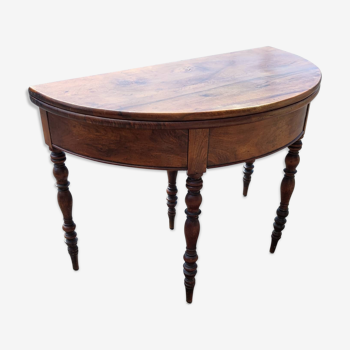 Half moon console opening on a solid walnut round table