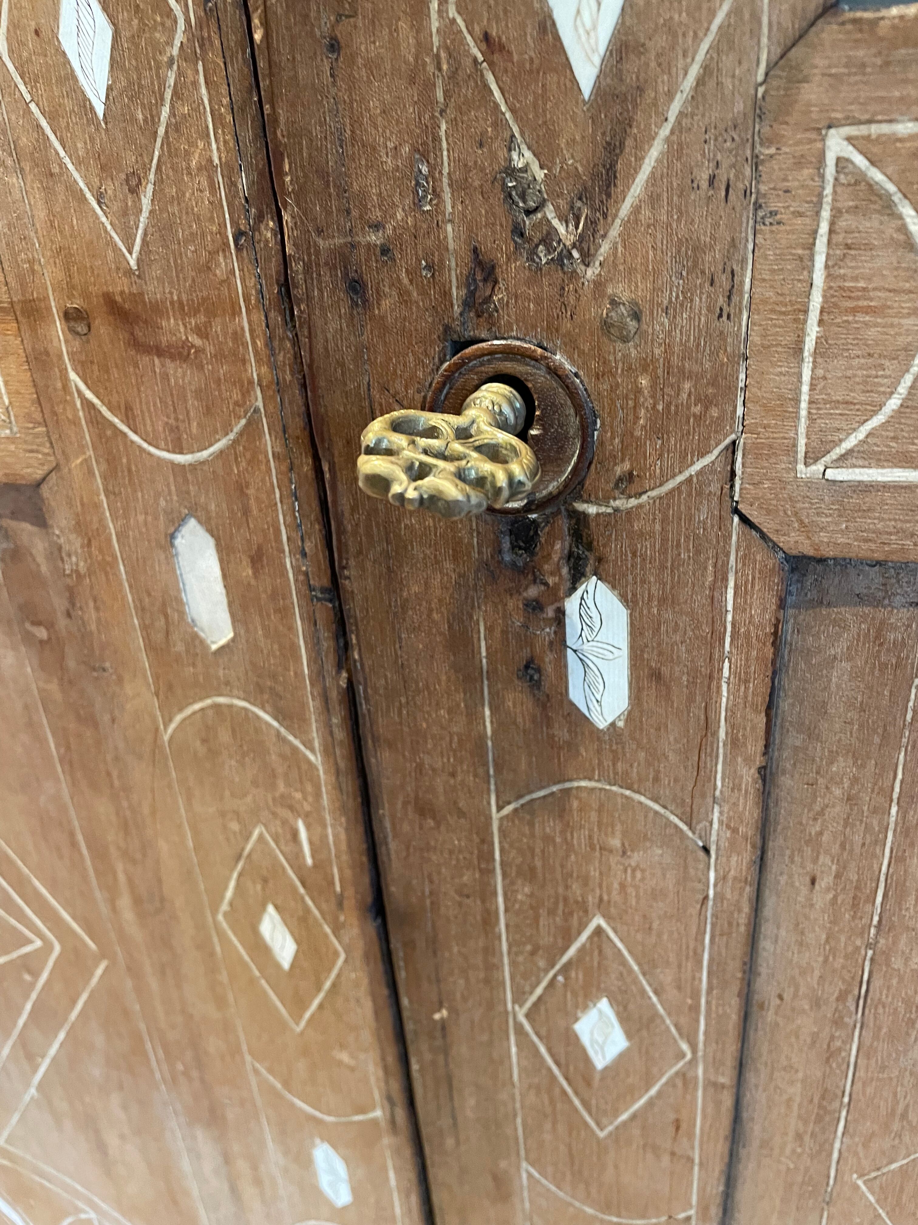 Oriental corner cabinet