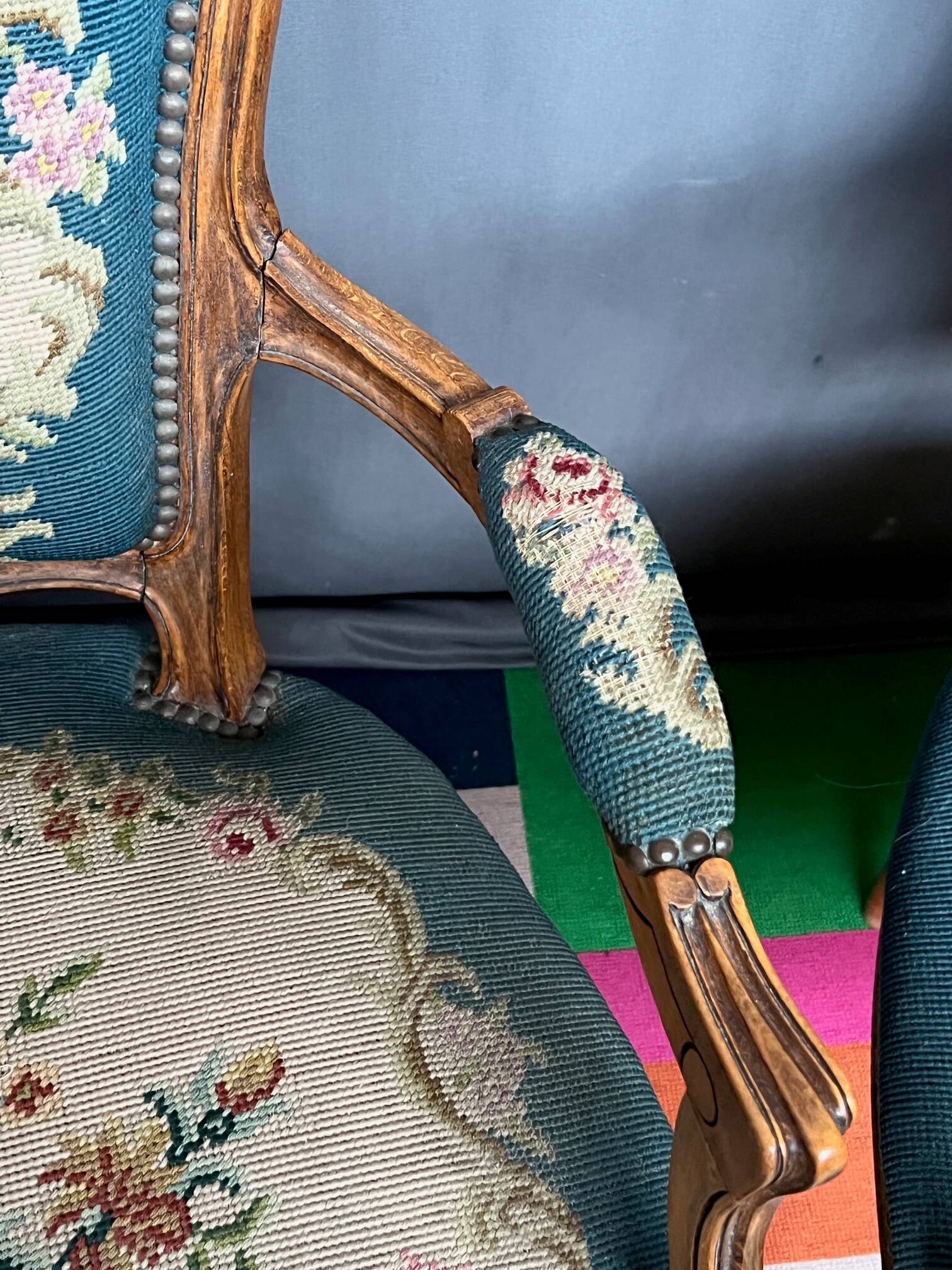 Pair of hand-embroidered armchairs. Walnut.