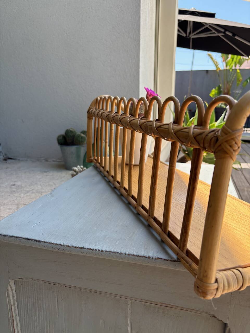 Superb and rare vintage rattan shelf.