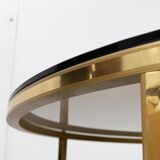 Mid-century Hollywood Regency style coffee table in brass and glass, made in Germany by Vereinigte Werkstätten, 1960s.