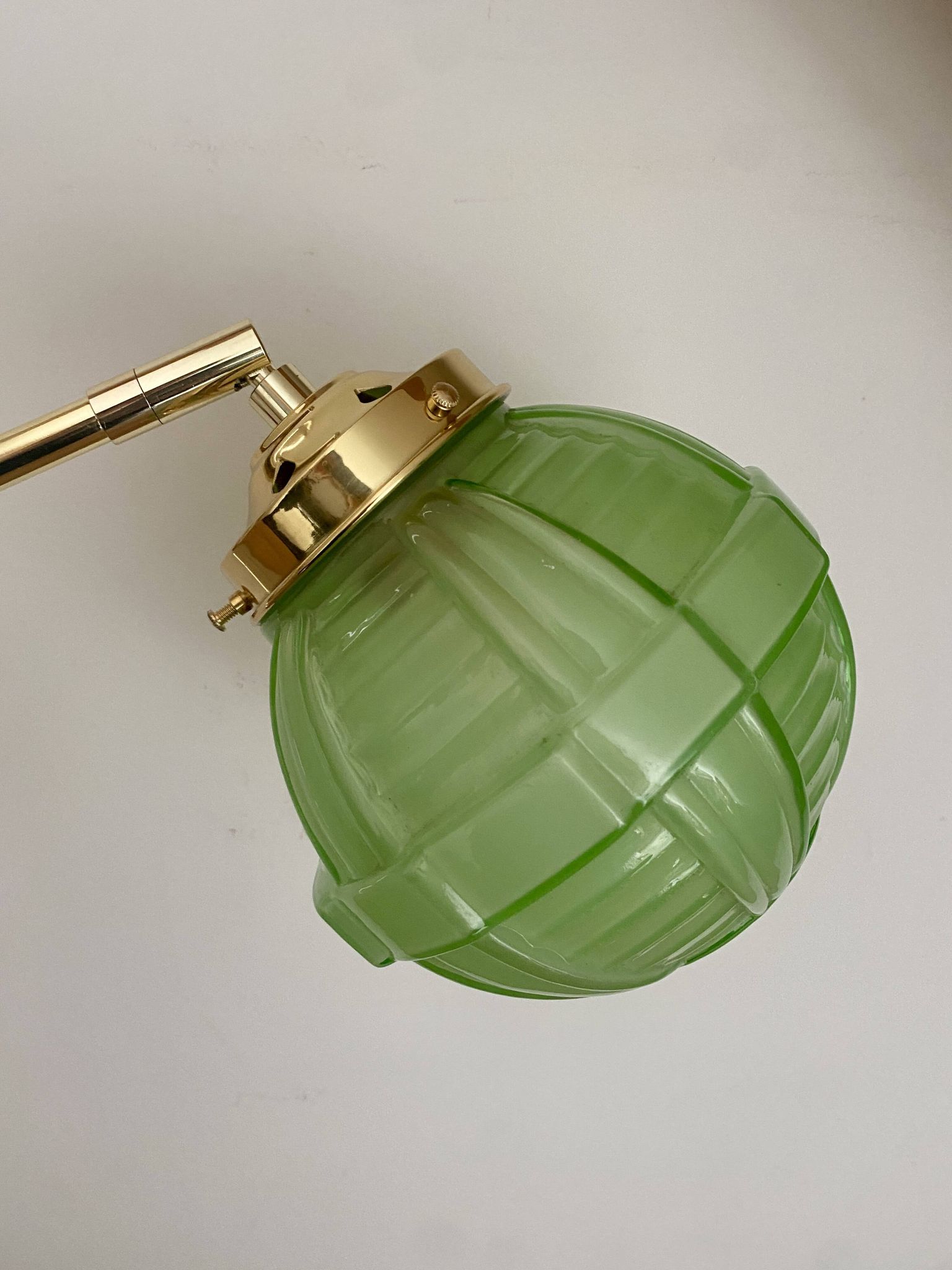 Vintage art deco globe wall light in green glass