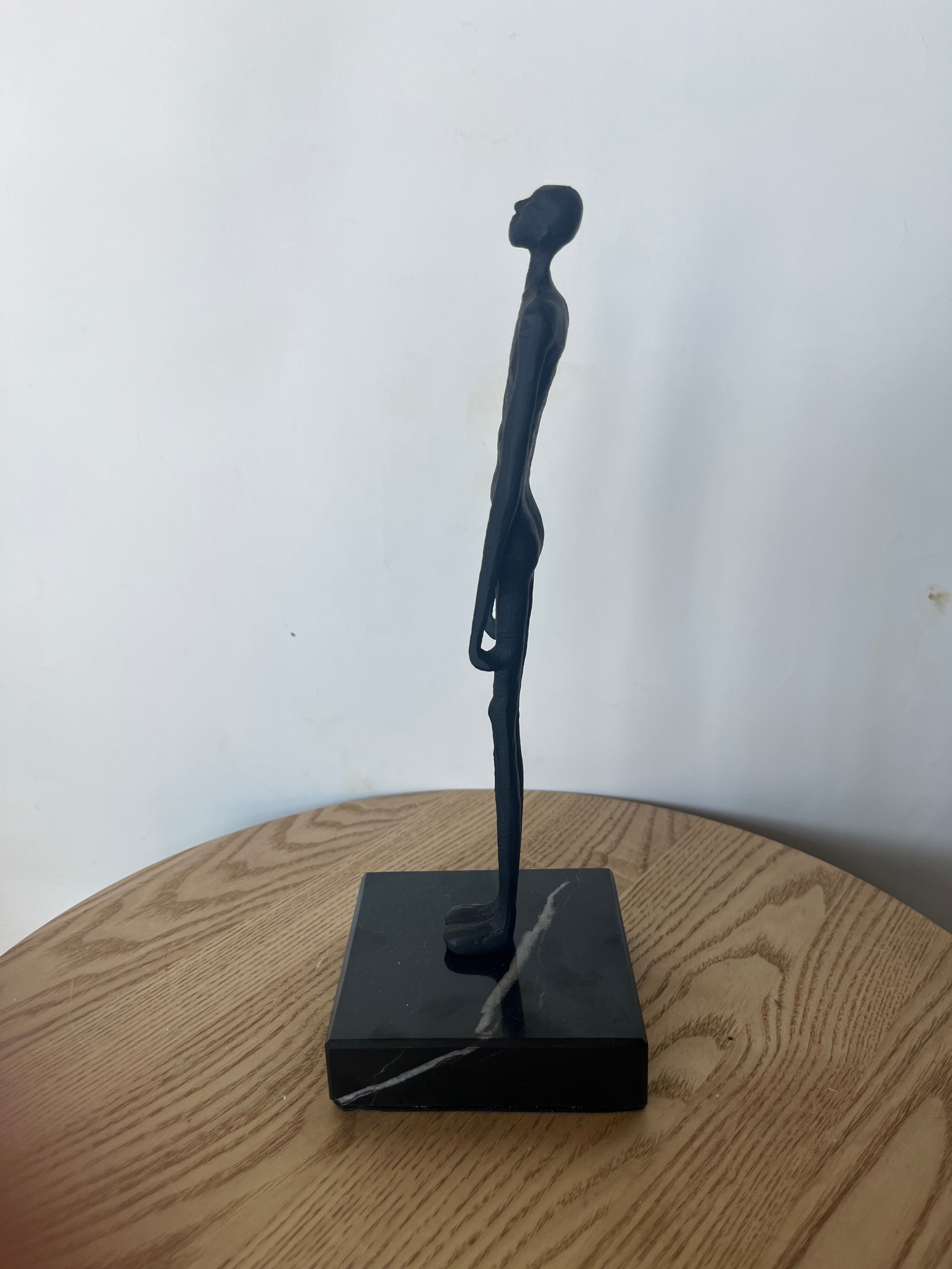 Standing Man by Giacometti