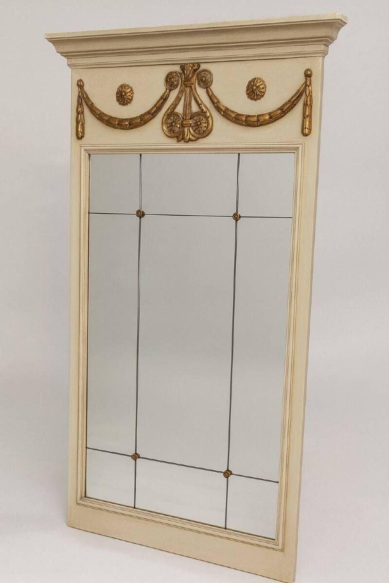 Louis XVI style trumeau mirror with a painted wooden frame.