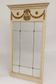 Louis XVI style trumeau mirror with a painted wooden frame.