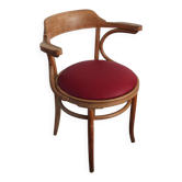 Vintage curved wooden armchair