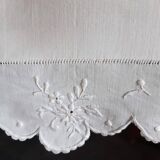 scalloped pillowcase decorated with a baron's crown