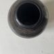 Brown-black glazed stoneware vase, signed underneath the base, circa 1950.