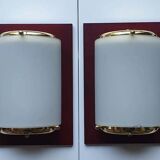 Four vintage gold wall lights with opaline globes on wooden support