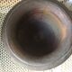 Cast iron mortar and wooden pestle