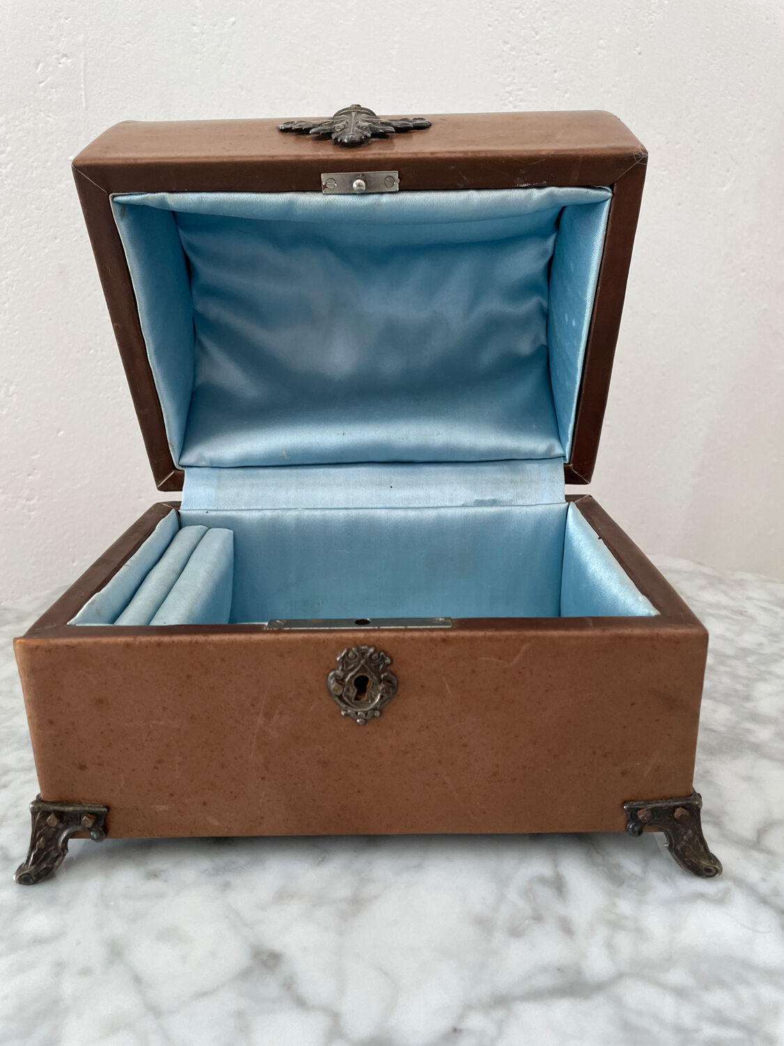 Vintage leather and silver metal jewelry box.