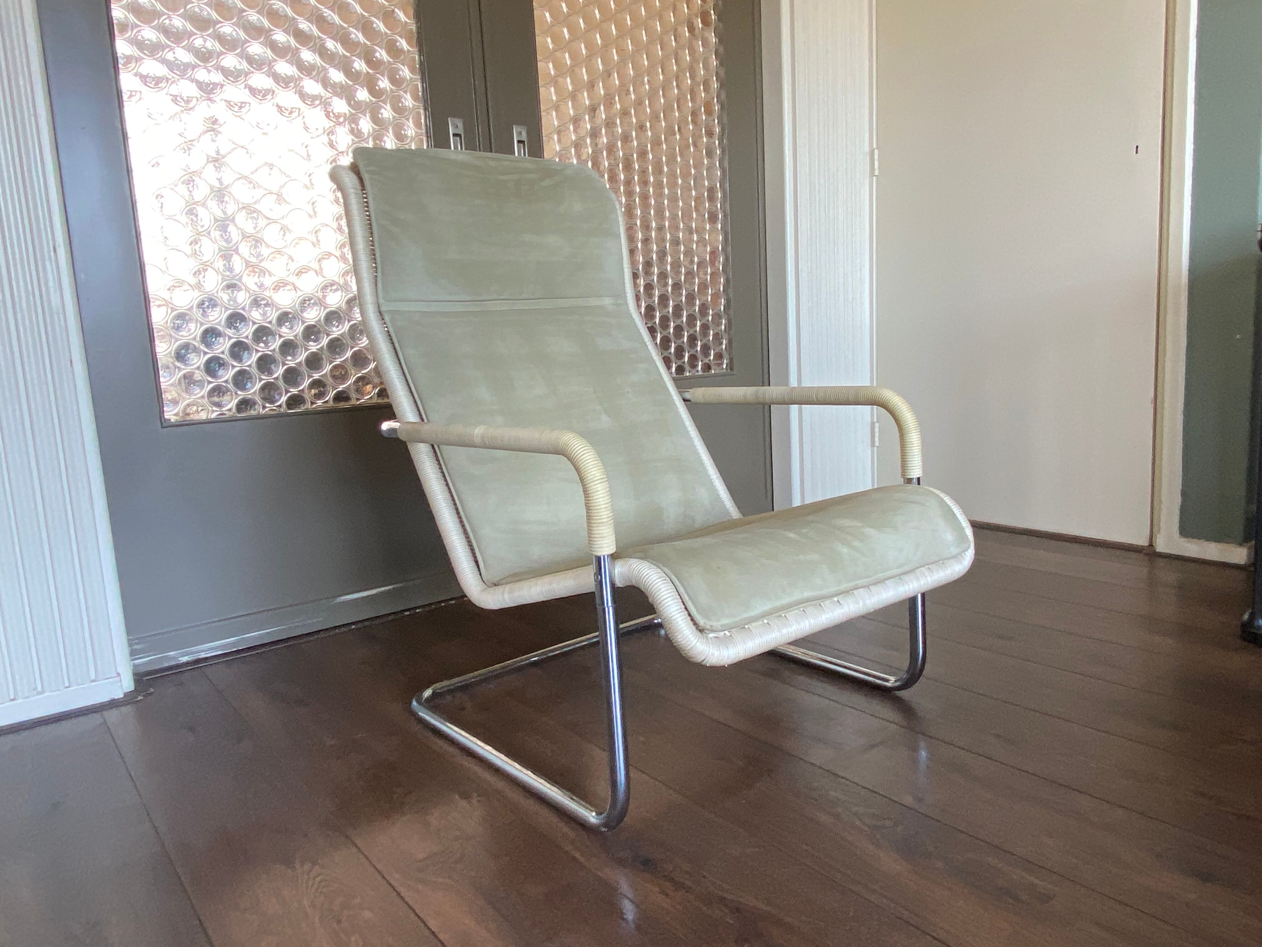 Vintage modernist chromed tubular steel, rattan & leather easy chair