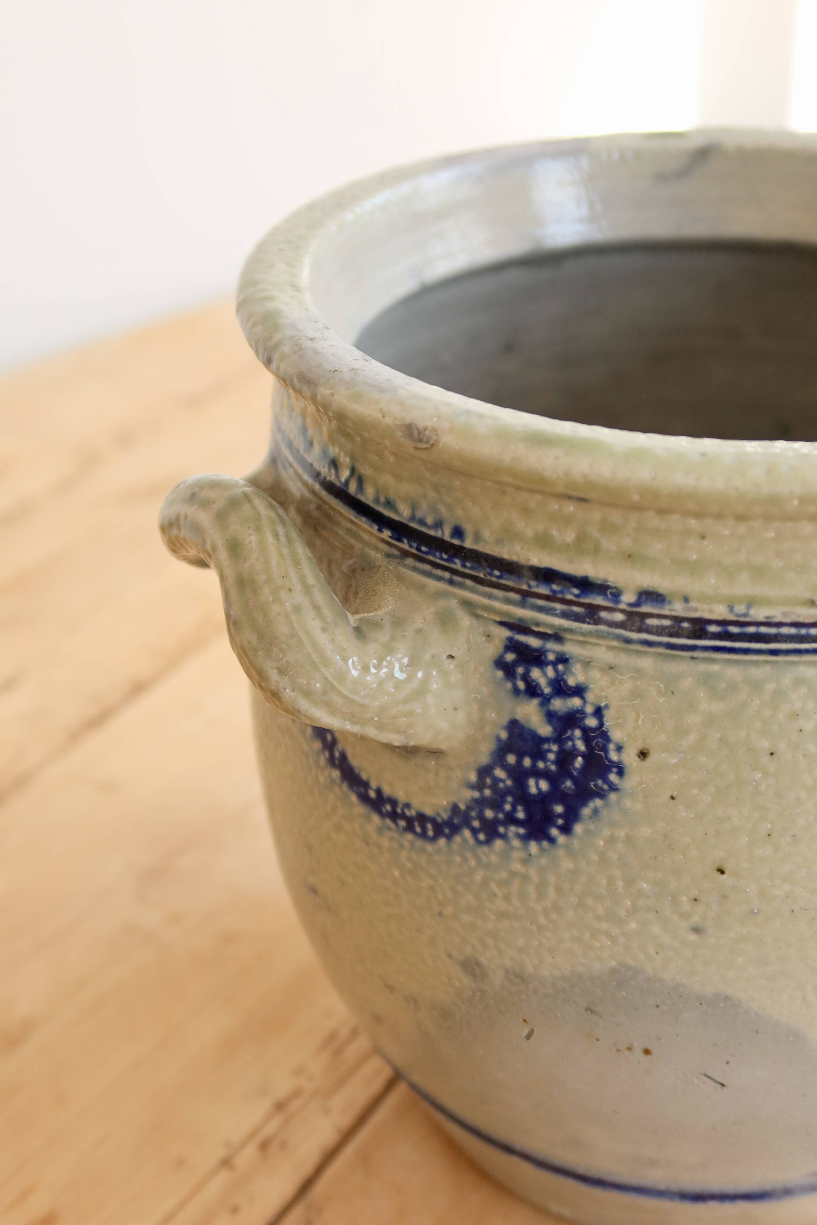 Old ceramic jar from Alsace with blue decoration.
