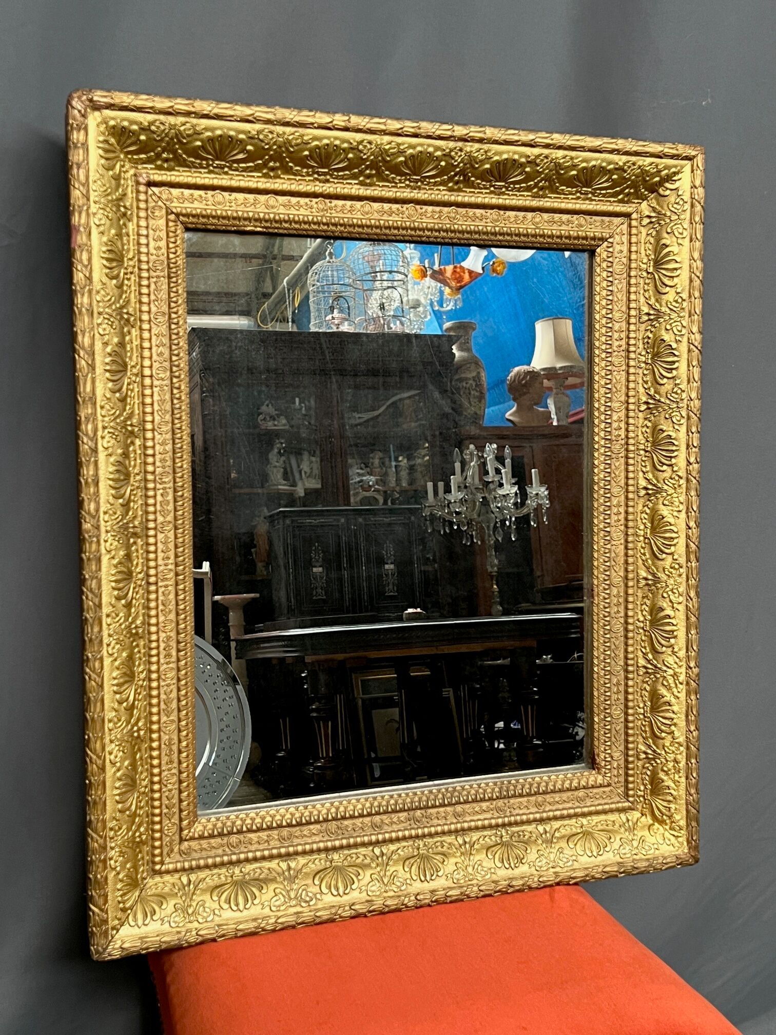 Antique mirror in a baguette frame