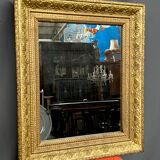 Antique mirror in a baguette frame