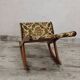 Antique rocking footrest