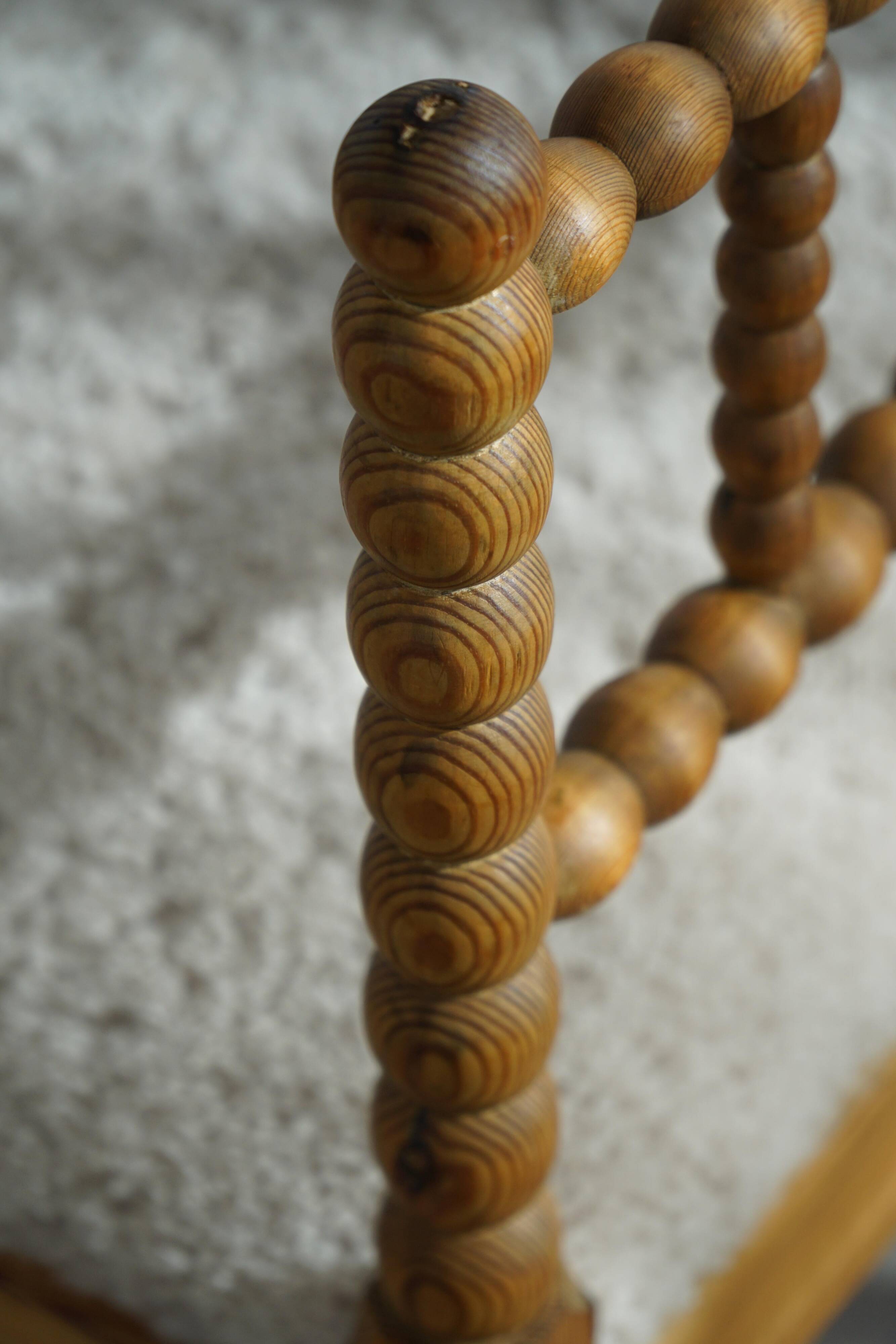 Antique French corner chair handcrafted with lamb's wool, early 20th century.