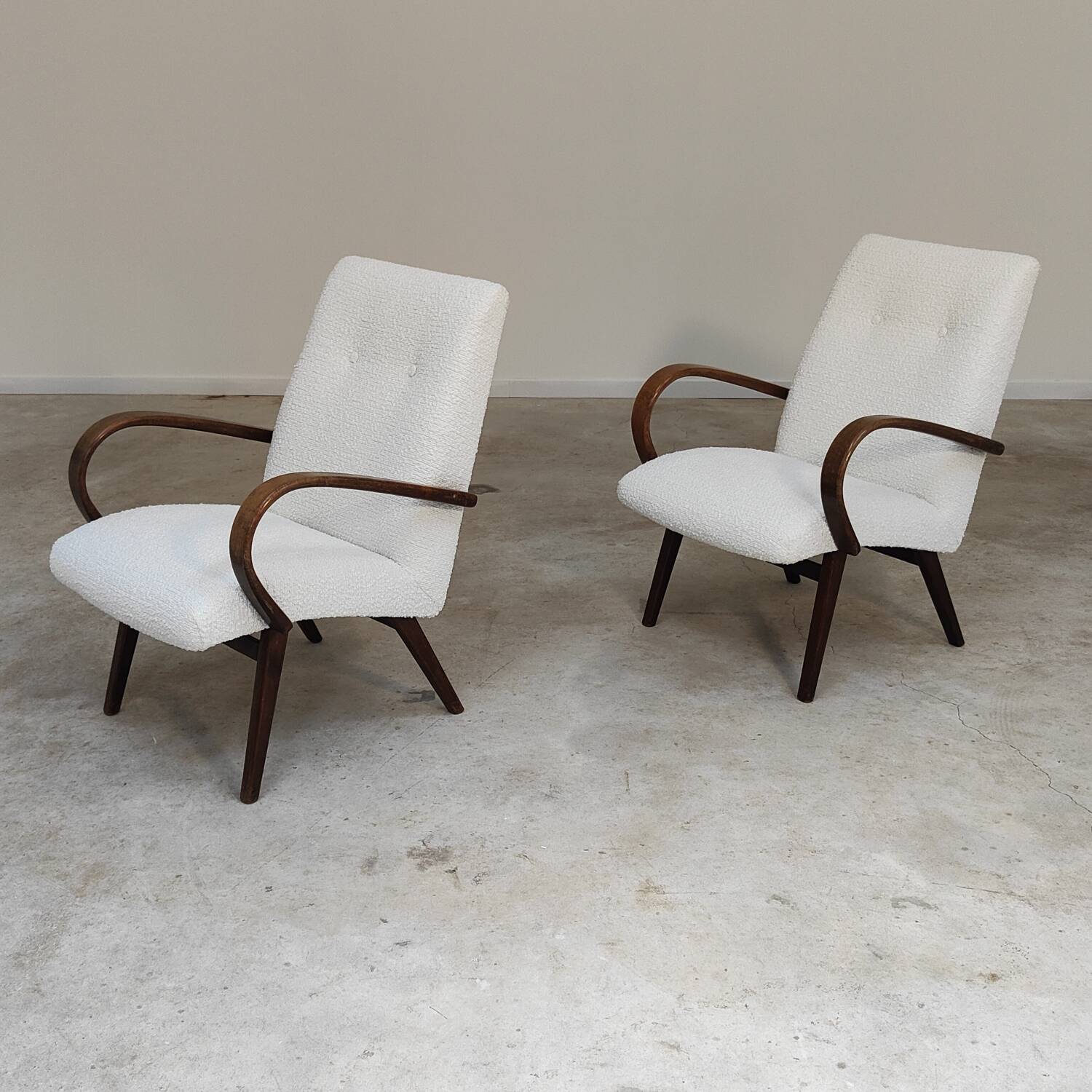 Pair of Jaroslav Smidek armchairs for Ton Bystrice, restored with white boucle, 1960.