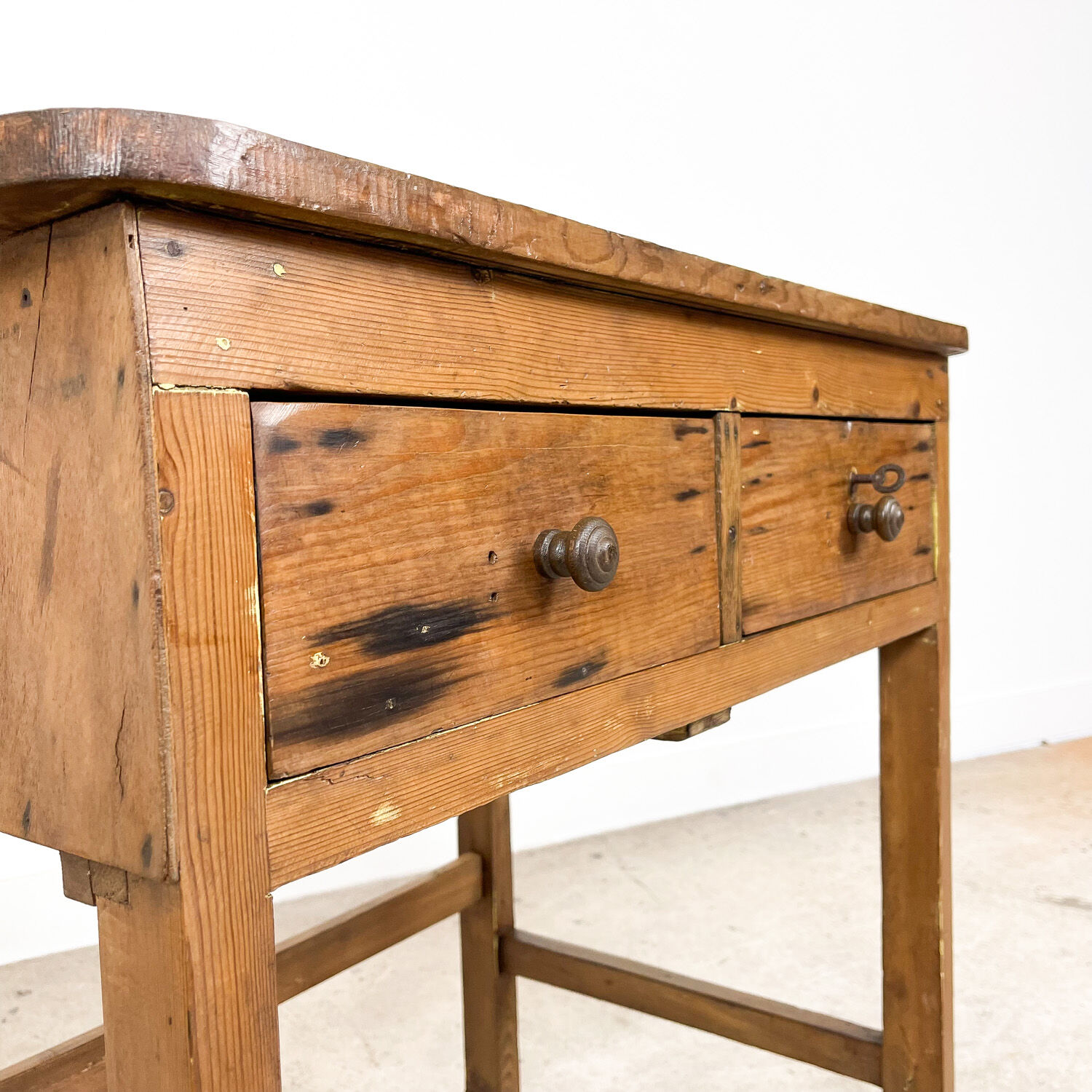 Vintage industrial wooden side table with drawers on casters
