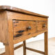Vintage industrial wooden side table with drawers on casters