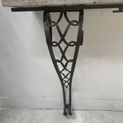Art Deco console in hammered wrought iron, 20th century.