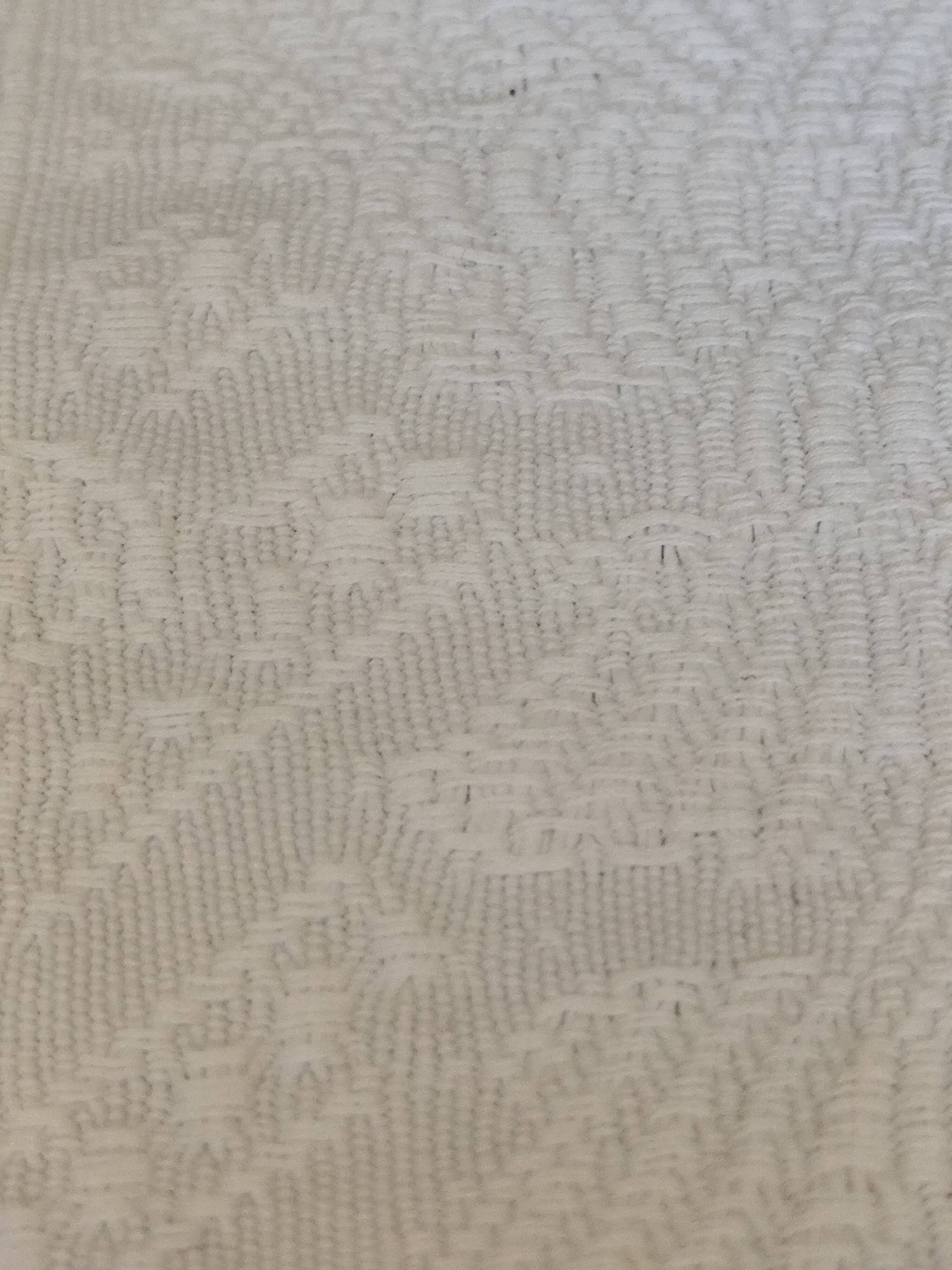 White woven cotton bedspread with fringes