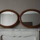 Paire de miroirs anciens ovales