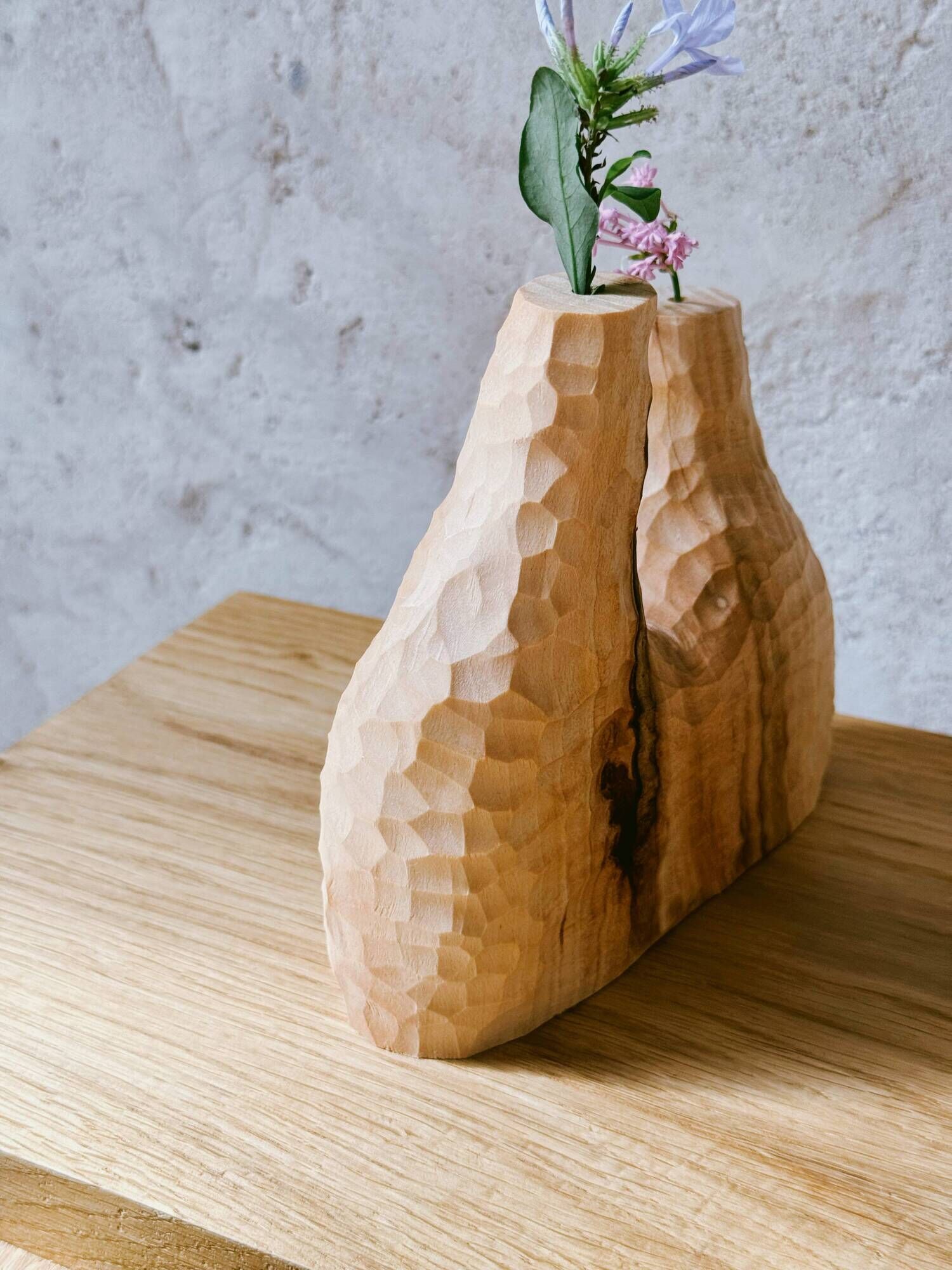 Hand-carved soliflore vase in solid lime wood.